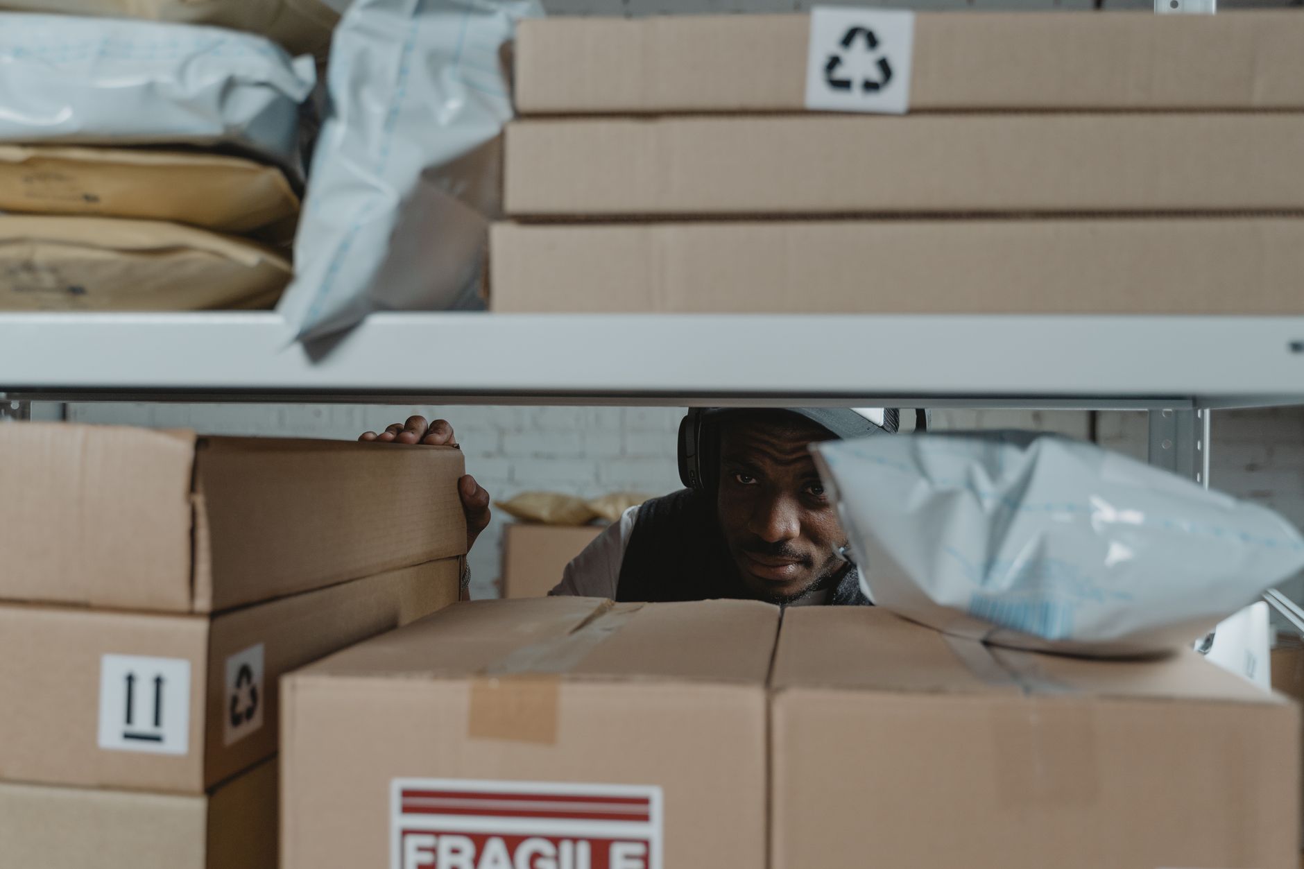 Warehouse shelves stacked with boxed goods